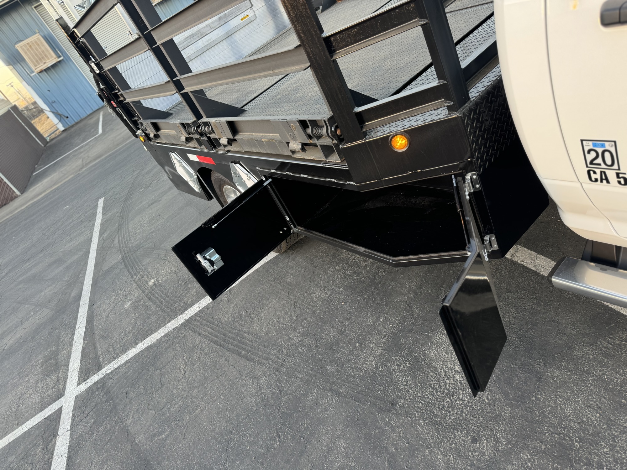 Equipment mounting detail underneath a custom truck bed
