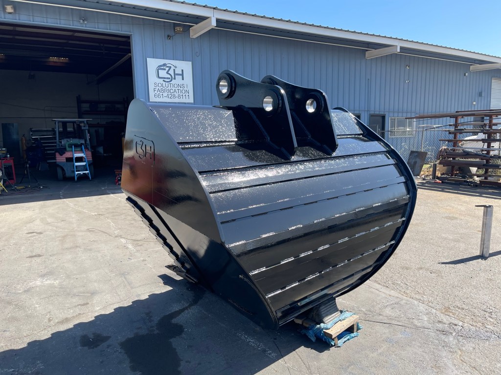 Custom heavy-duty excavator bucket at C3H Solutions shop
