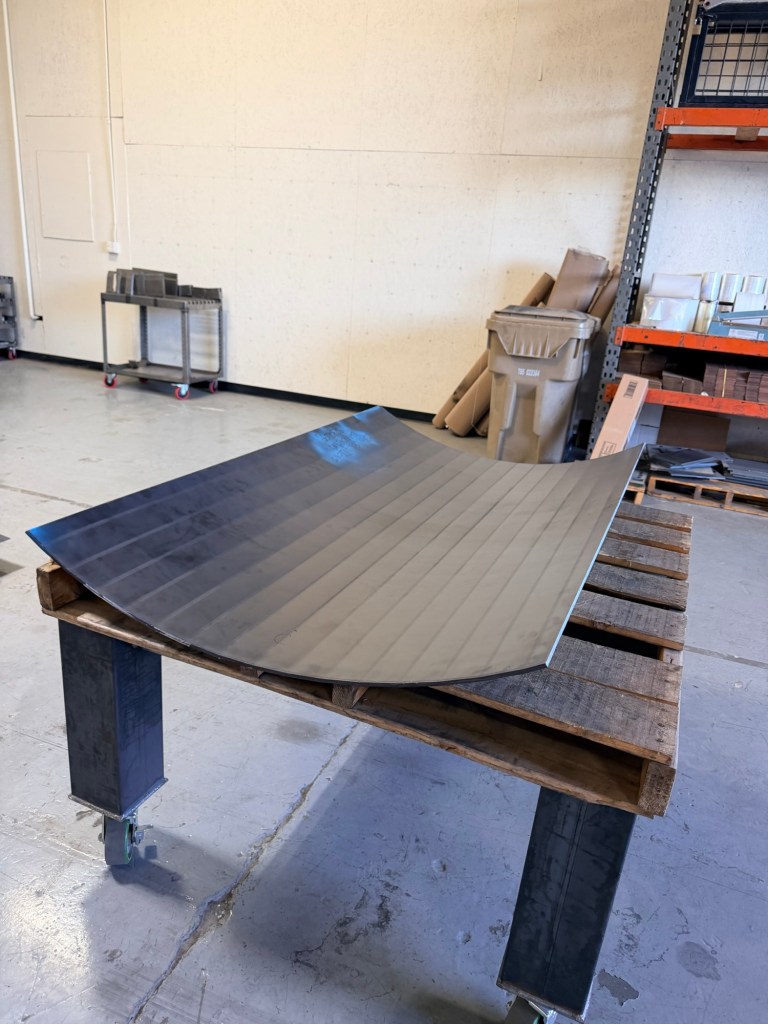 Large curved steel plate formed for a fabrication project