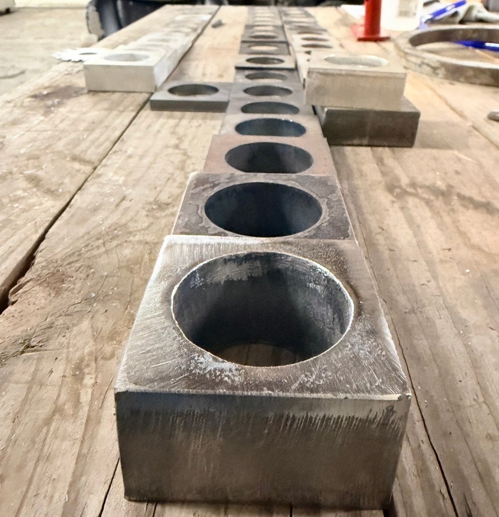Thick steel plate with precision laser-cut openings