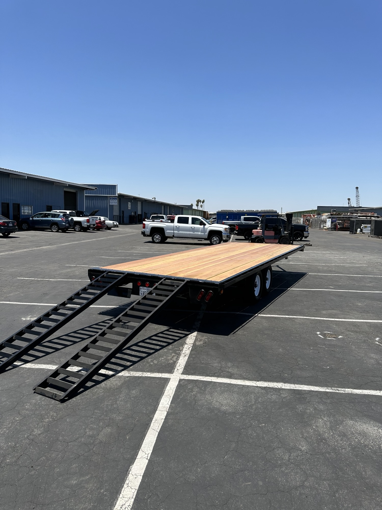 Rear loading ramps on a custom flatbed trailer