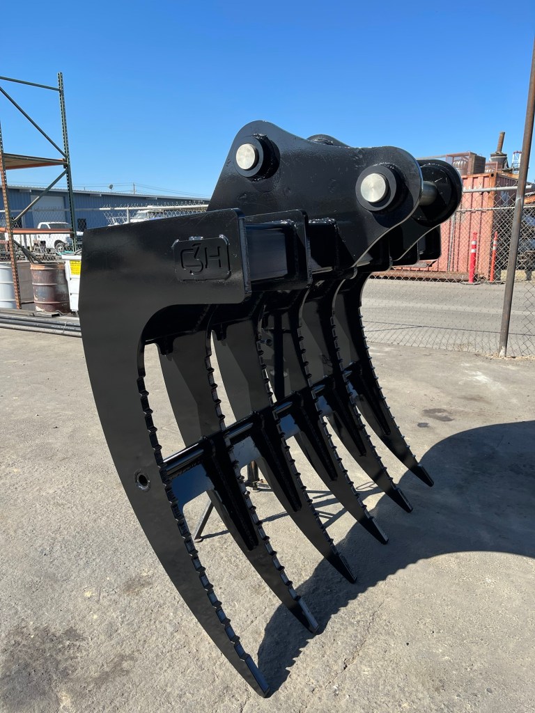 Custom excavator rake fabricated by C3H Solutions
