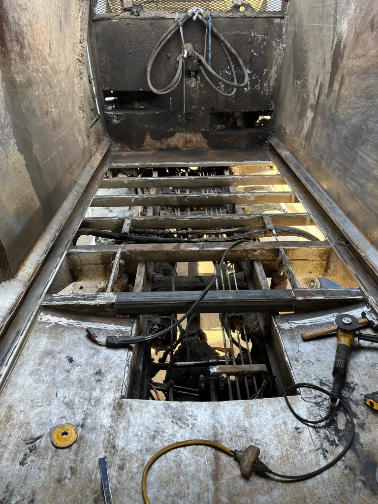 Sanitation truck body framework repair