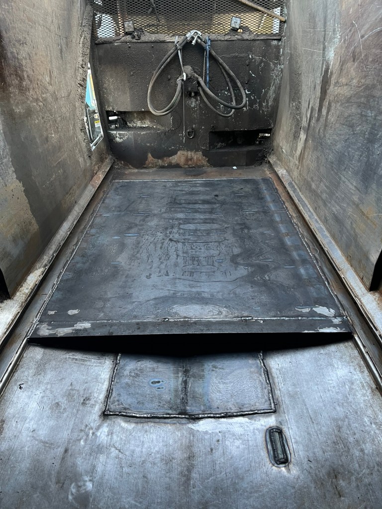 Interior sanitation truck metal repair before finishing