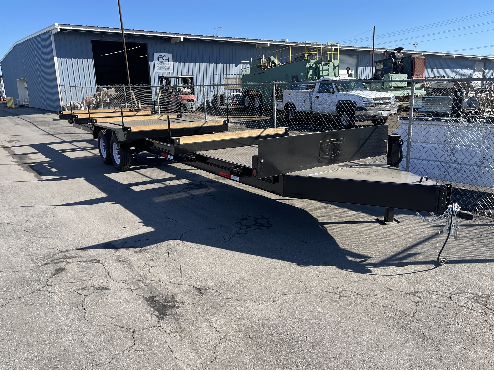 Custom flatbed trailer frame and deck in the C3H yard