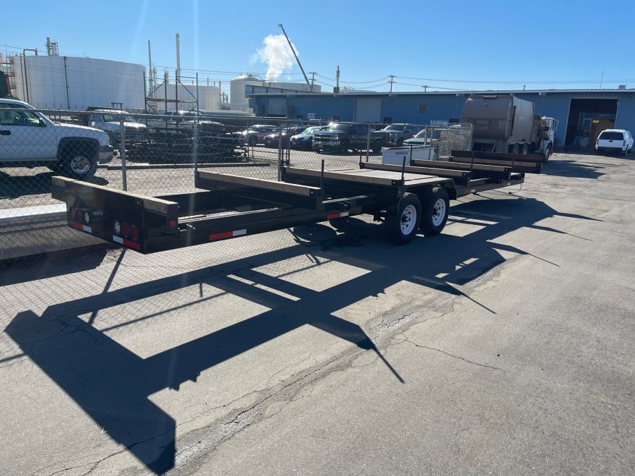 Custom dual-axle flatbed trailer fabricated by C3H Solutions