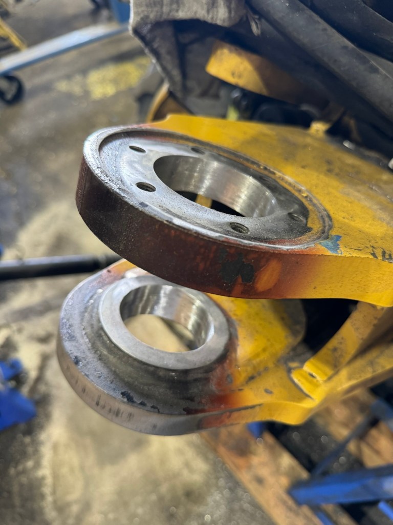 Line bored pin bores on a heavy equipment attachment in Bakersfield