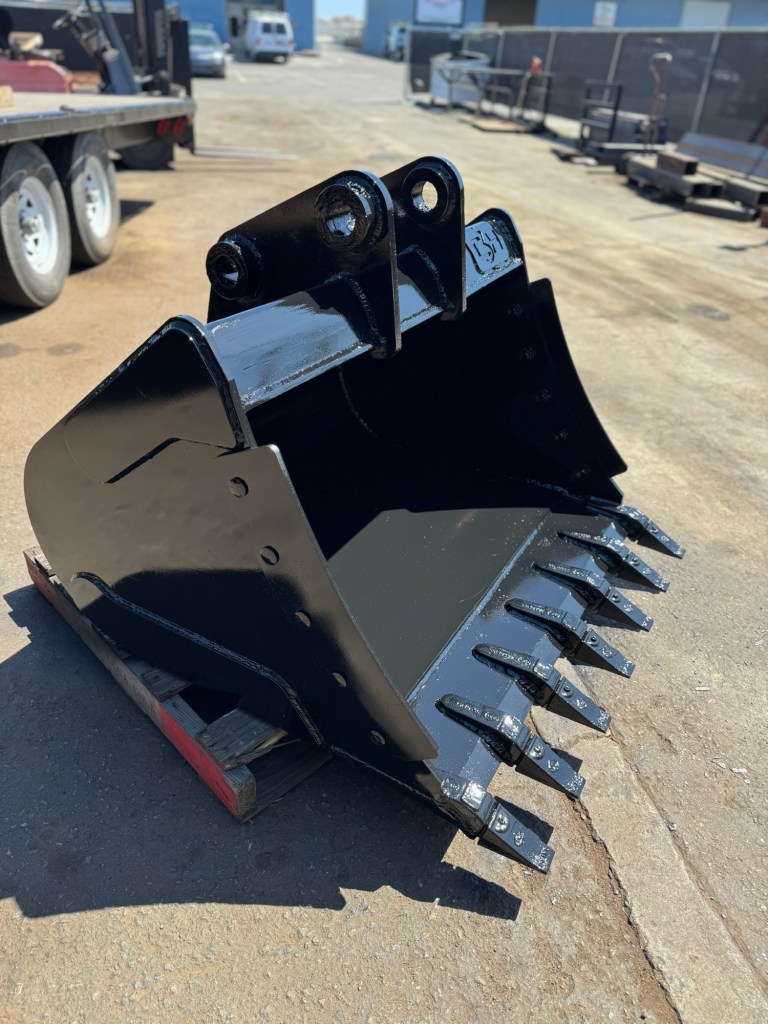 Heavy-duty bucket with teeth and mounting ears