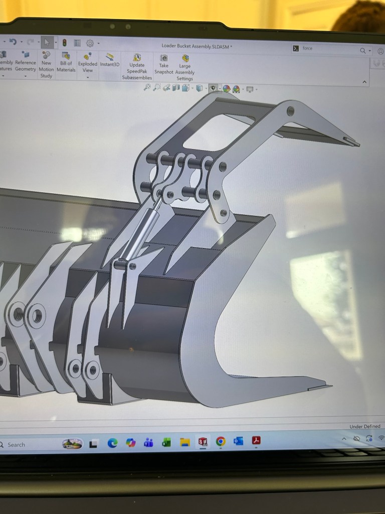CAD drawing of a custom grapple bucket assembly