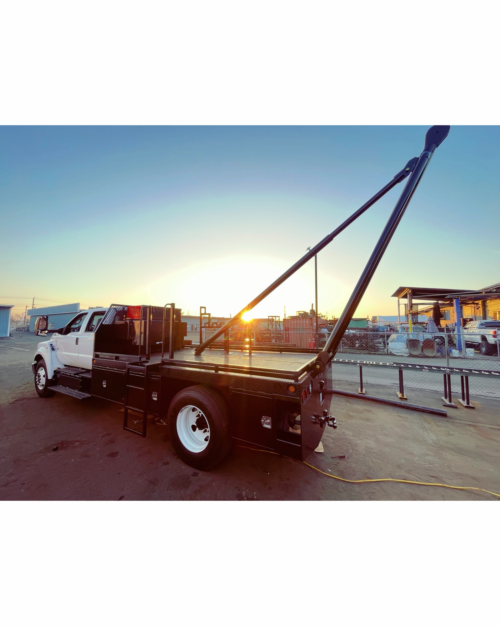 Custom fleet truck bed and rack at sunset